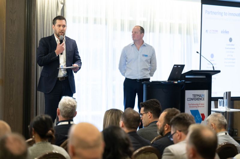 EGM Marc Fitcher (left) and Sam Wishart (right) presenting on leveraging artificial intelligence to increase efficiency, lower cost, and improve student experience.