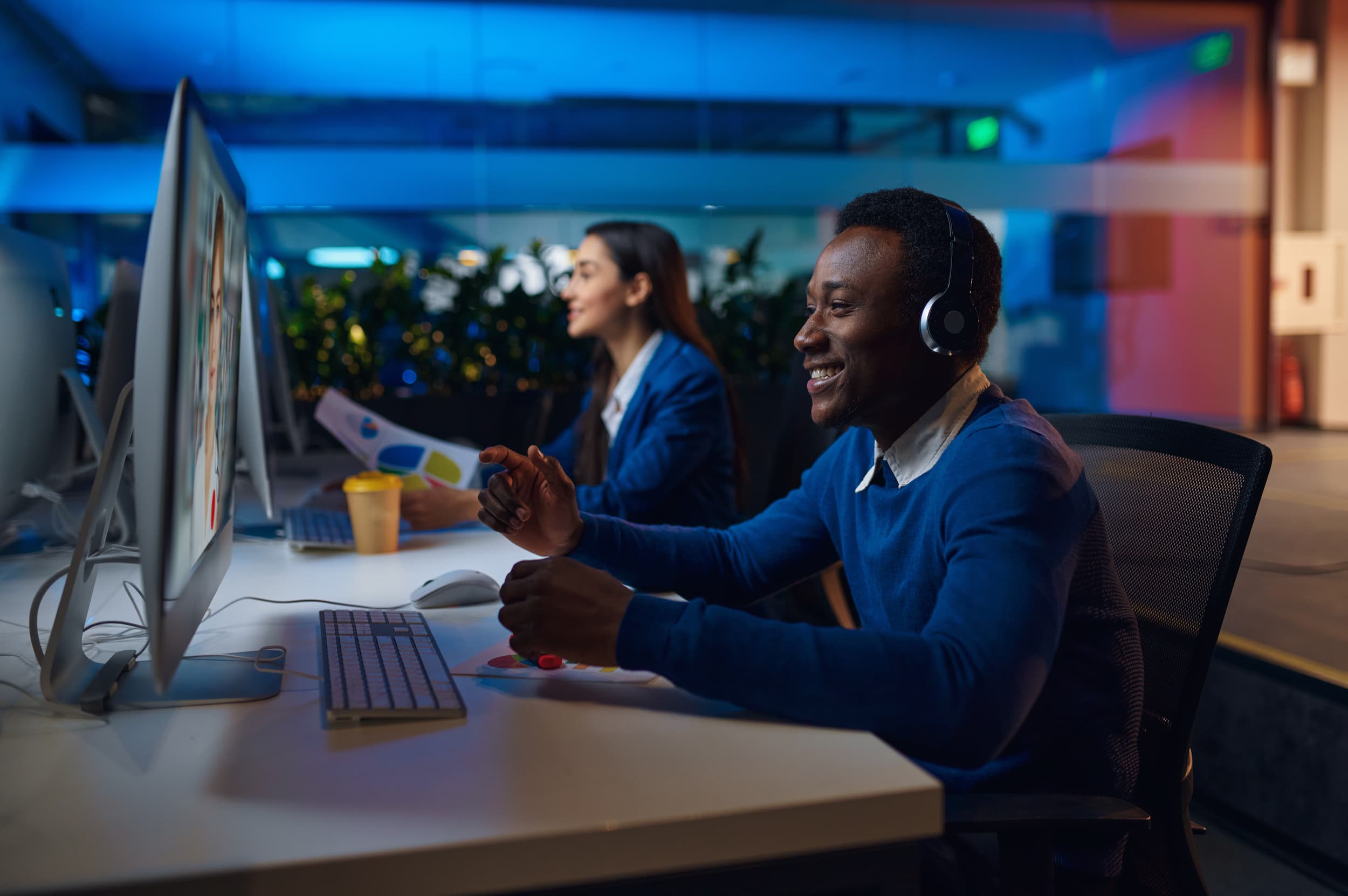 Night shift managers smiling during video call at Cirka