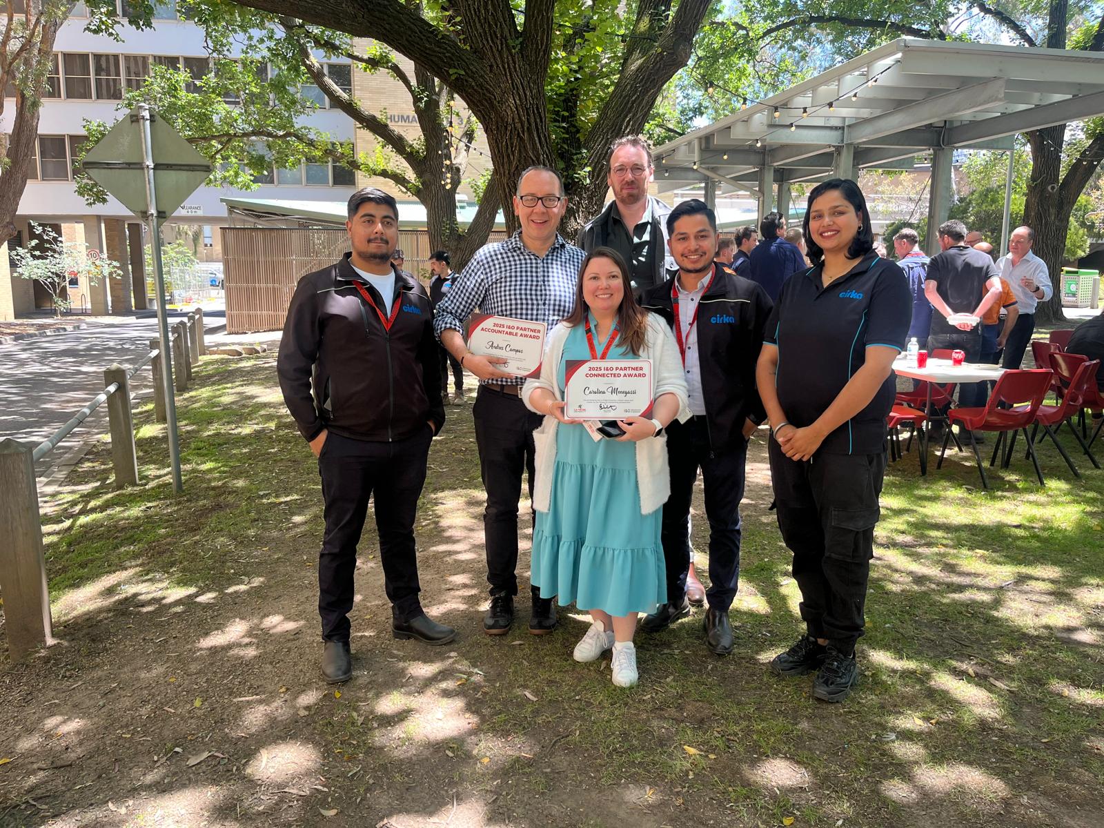 Cirka Team posing with an award at LTU